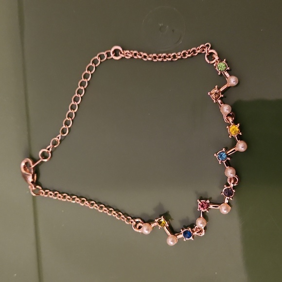 5/$12 Jewelry Gold bracelet with multi color Rhinestones and white pearls - Picture 2 of 3